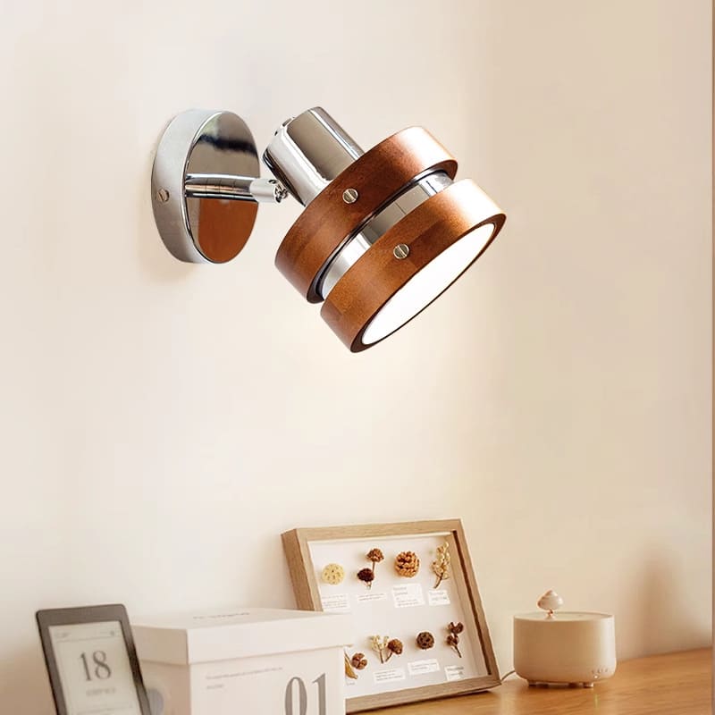 Contemporary wood and metal lamp lighting a hallway entrance