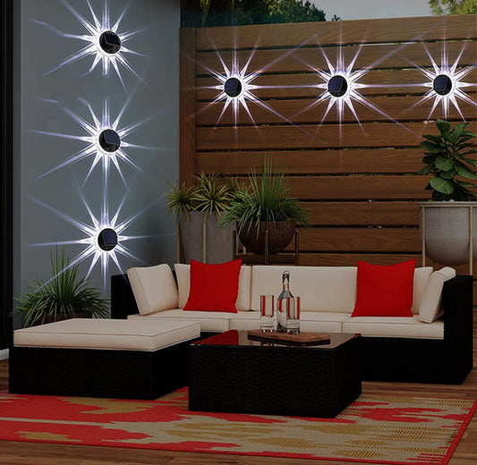 Solar-powered light casting a warm glow on a patio